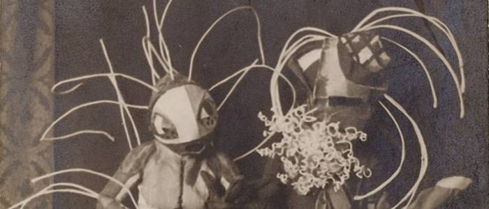 German expressionist costumes of bugs.