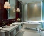 hotel bathroom with large stand alone bathtub